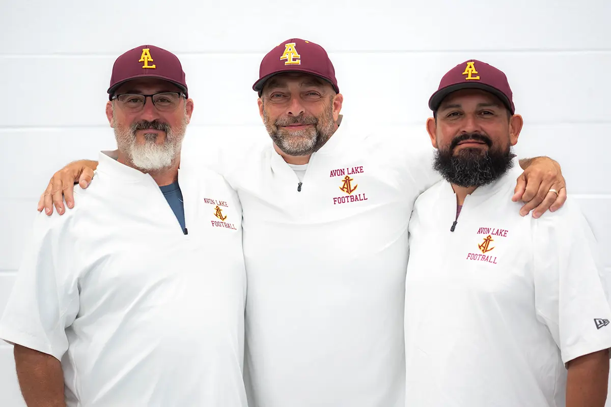 Coach Sedlick OC, Coach Grumbos HC, Coach Gurule DC